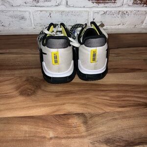 Nike White and Black Sneakers with Yellow Accents